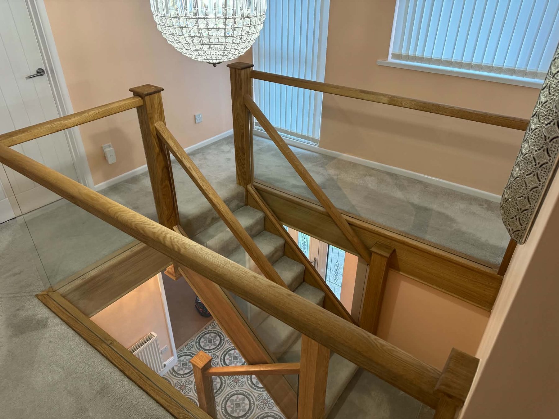 Glass balustrade staircase overhead